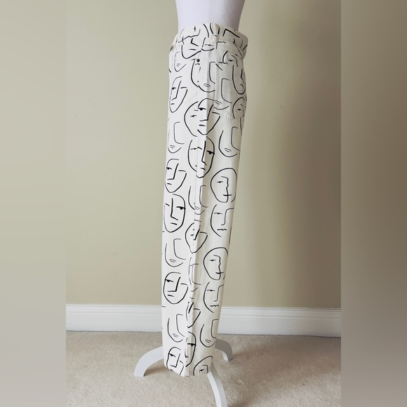 Shekou "Little Things" white denim jeans with a black abstract face print EUC - Picture 2 of 6